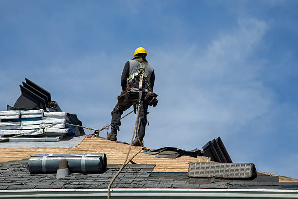 Professional Storm Damage Roof Repair technician working in Fresno, CA